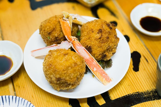 Best of Shinjuku: Izakaya Food Tour (4 Stops, 14+ Tastings) - Walking through Kabukicho between bites