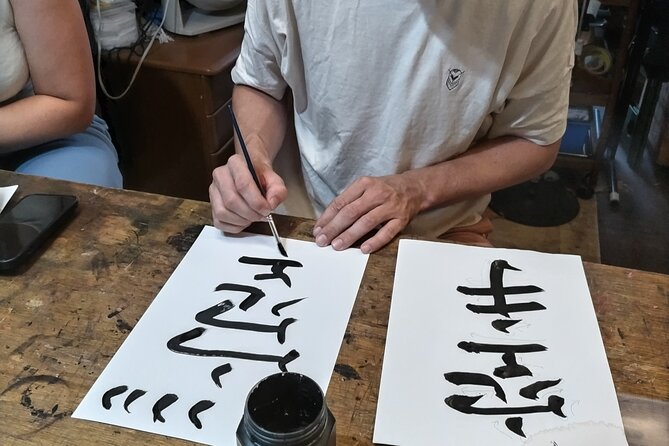 Calligraphy on T-shirt or lantern near Skytree Tokyo - Choosing Between a Shirt, Lantern, and Umbrella