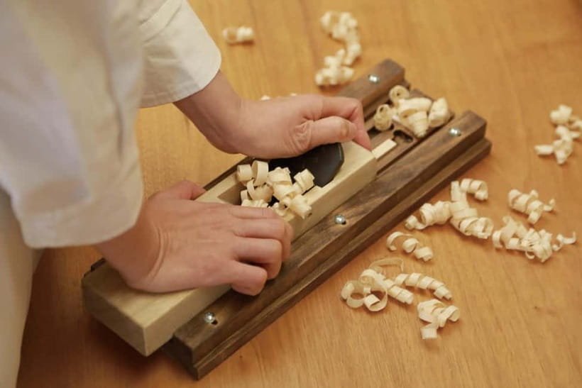 Chopstick Making Workshop in Ginza - Shaping the chopsticks with a hand plane