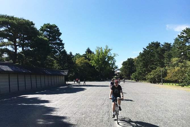 Full Day Biking Tour Exploring the Best of Kyoto - Kitano Tenmangu, a shrine with a local rhythm