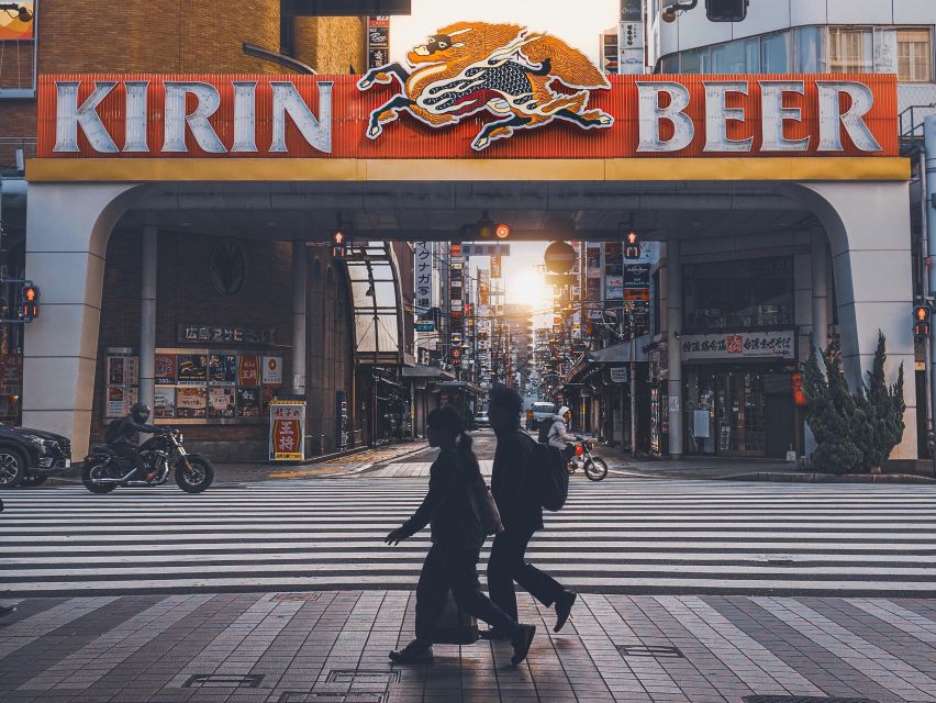 Hiroshima: Hidden Gems and Highlights Private Walking Tour - Ekinishi and Nagarekawa after dark