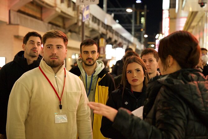 Japanese Food Experience Night Tour in Ueno - Meeting your guide near Ameyoko