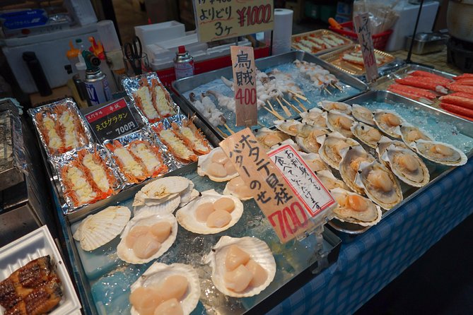 Kuromon Market Food Walking Tour in Osaka (6 stops, 6 tastes) - Kuromon Market gives you Osaka in edible form