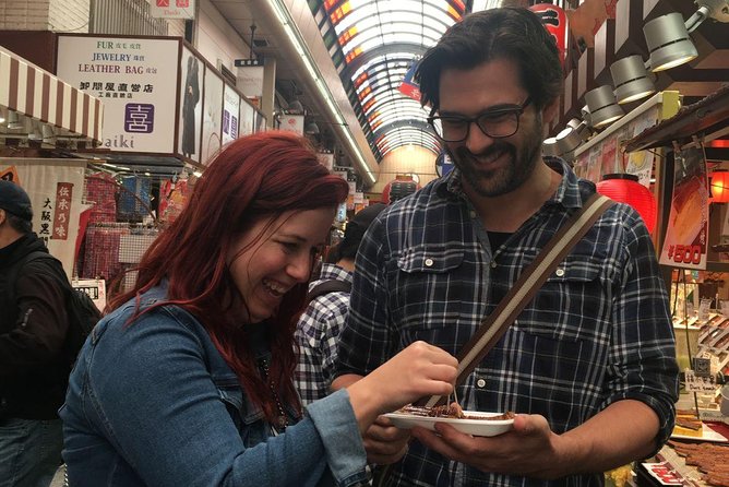 Kuromon Market Food Walking Tour in Osaka (6 stops, 6 tastes) - Namba Grand Kagetsu brings in Osaka humor