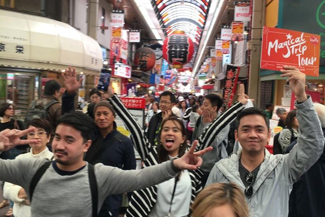 Kuromon Market Food Walking Tour in Osaka (6 stops, 6 tastes) - Namba and Dotonbori show two sides of Osaka
