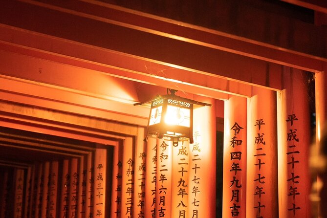 Kyoto Fushimi-Inari Night Walking Tour - Walking beneath the torii gates