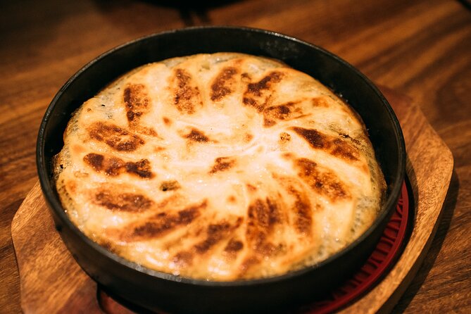 Kyoto: Gion Local Food Tour (Taste 15 Dishes) - Stop two: crispy tonkatsu in Gion