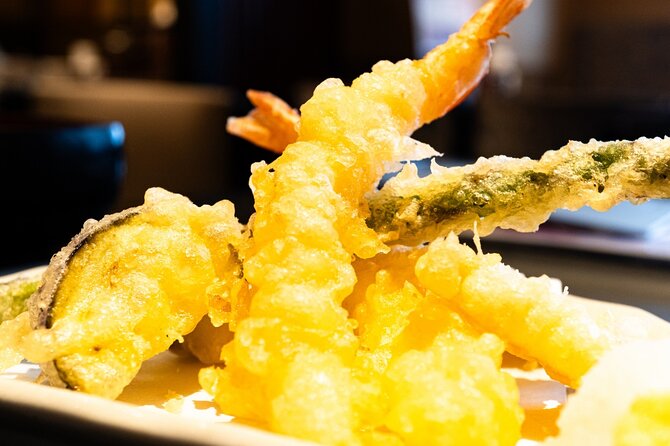 Kyoto: Gion Local Food Tour (Taste 15 Dishes) - Stop one: yakitori and everyday izakaya food