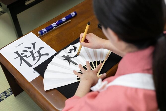 Learning Zen of Japanese Calligraphy in kimono near Osaka Castle - Practice sheets, final drafts, and take-home art