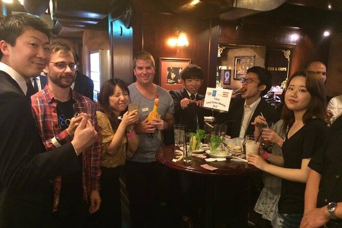Meet Locals experience Fun Chat Drink Osaka International Party - Check-in, wristbands, and conversation goals