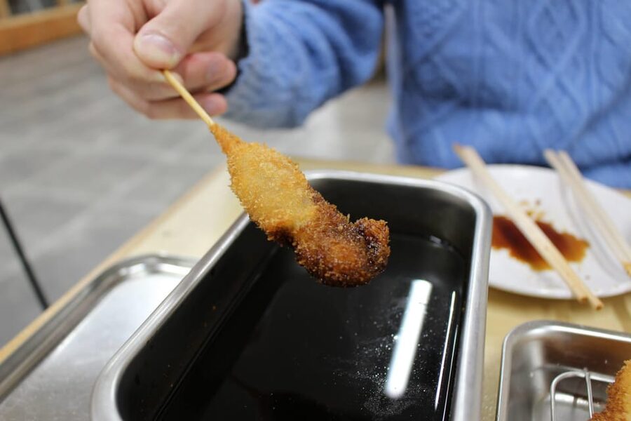 Osaka: 2-Hour Local Street Food Tour – Dotonbori & Namba - A second pass through Dotonbori