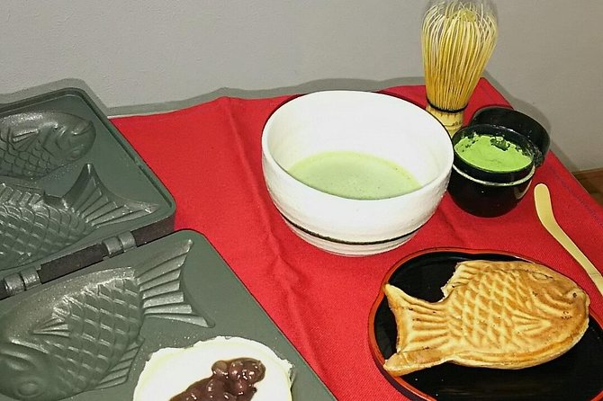 Osaka Cooking Class: Okonomiyaki &Japanese cuisines experience - Turning batter into takoyaki