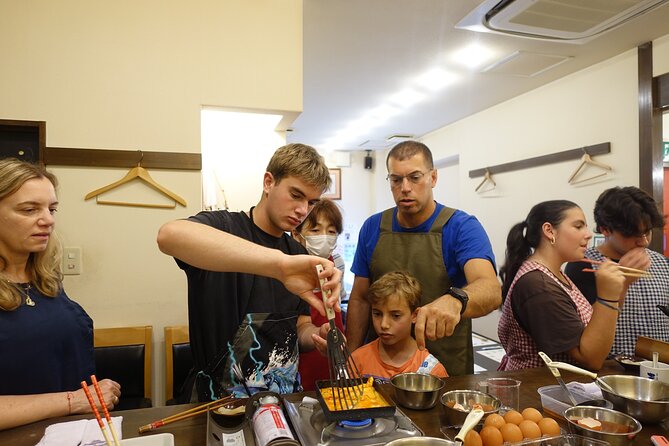 Osaka Japanese Cooking And Matcha Class near Osaka Castle - Adding the sake tasting