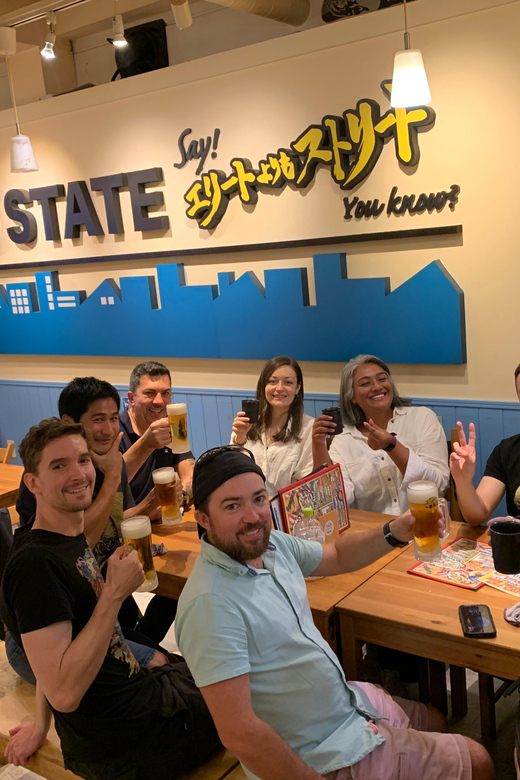 Osaka: Namba Pub Bar Crawl with a Local Guide - Finding the green-banded guide in Shinsaibashi