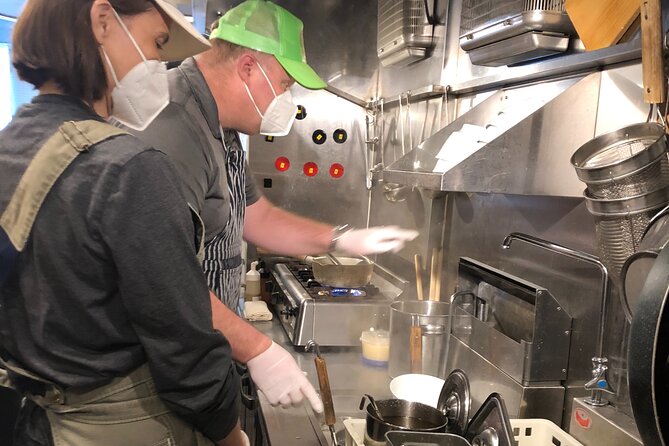 Ramen Craftsman Experience in Osaka - Behind the counter at Menya SHU