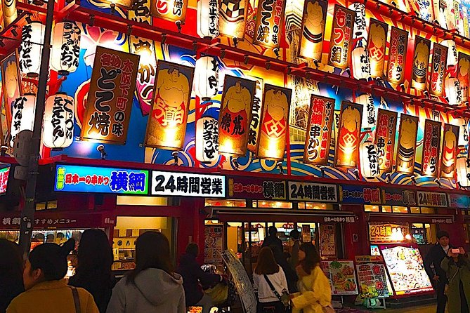 Retro Osaka Street Food Tour: Shinsekai - Mixed juice, takoyaki, and hands-on eating