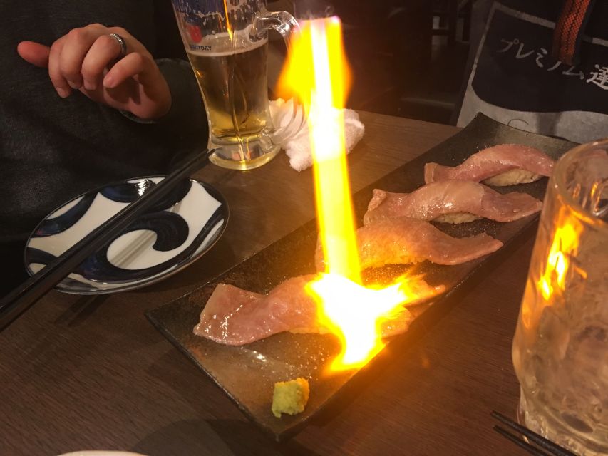 Shibuya Meltdown Night Tour: All-You-Can-Drink Bar Hopping - Sake, small plates, and talking with locals