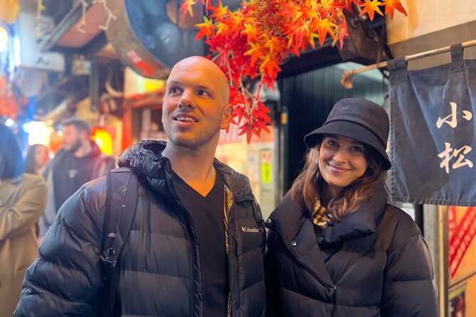 Shinjuku: Food Tour – 15 Dishes at 4 Eateries - Godzilla Head and the city after dark