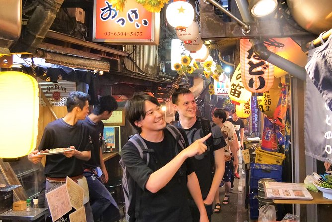 Tokyo Bar Hopping Tour in Shinjuku (All-You-Can-Drink + Dinner) - Godzilla Head and the walk between districts