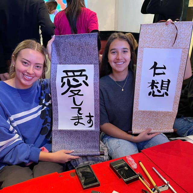 Tokyo: Calligraphy on Kanji Fan & Scroll with Drink - Making the fan and hanging scroll