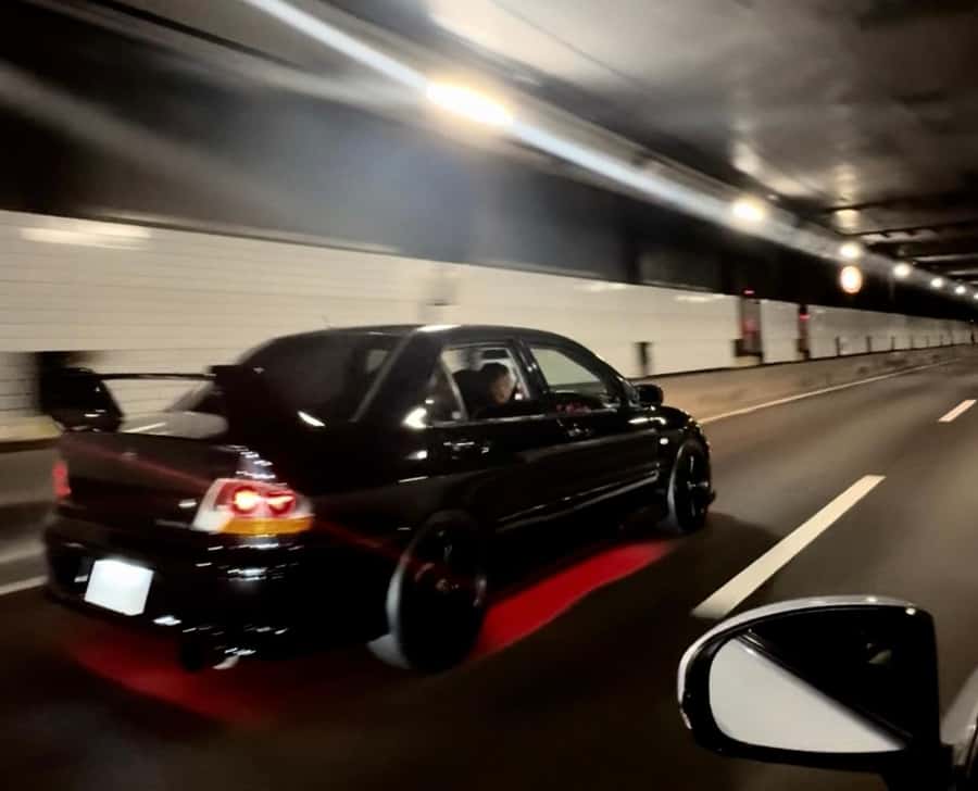 Tokyo: Daikoku: JDM and Tokyo Car Culture Experience - Arriving at Daikoku Parking Area after dark