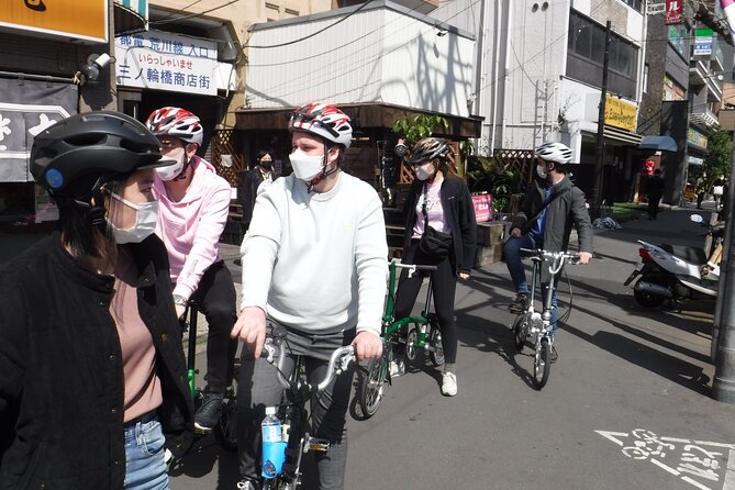 Tokyo downtown bicycle tour Tokyo Backstreets Bike Tour - Honryuin Matsuchiyama Shoden and its unusual symbols