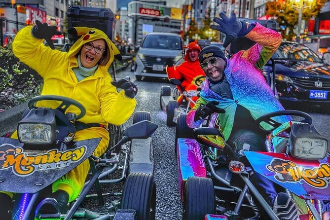 Tokyo Go-Kart Tour Shibuya-Harajuku-Shinjuku (<em>IDP Required) – Tokyo Go-Kart Tour: Key Points at a Glance’ /></p>
<ul>
<li><strong>Drive across Shibuya Scramble Crossing:</strong> The tour’s biggest thrill is crossing one of Tokyo’s most famous intersections from behind the wheel.</li>
<li><strong>See three central districts in one ride:</strong> The route links Shibuya, Harajuku Station, and Shinjuku in a compact city tour.</li>
<li><strong>A guide leads while taking photos:</strong> You can focus on the road instead of trying to photograph yourself safely.</li>
<li><strong>Costumes are optional:</strong> Dressing up adds a playful touch, but you can also ride in your own clothes.</li>
<li><strong>A paper IDP is essential:</strong> Japan does not accept digital permits, online copies, IDA or IAA permits, or 1968 Vienna Convention permits.</li>
<li><strong>Small groups keep the ride manageable:</strong> The listed maximum is four drivers, which makes following the guide easier.</li>
</ul>
<h2 id="what-this-tokyo-kart-ride-is-really-like">What This Tokyo Kart Ride Is Really Like</h2>
<p><img width="669" height="446" decoding="async" src=