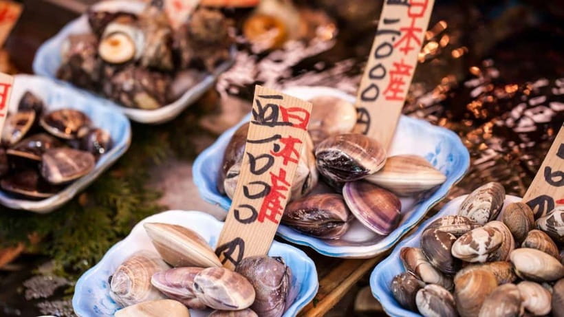 Tokyo’s Kitchen: Tsukiji Market Food & Culture Walk - Walking into Tsukiji Outer Market with a guide