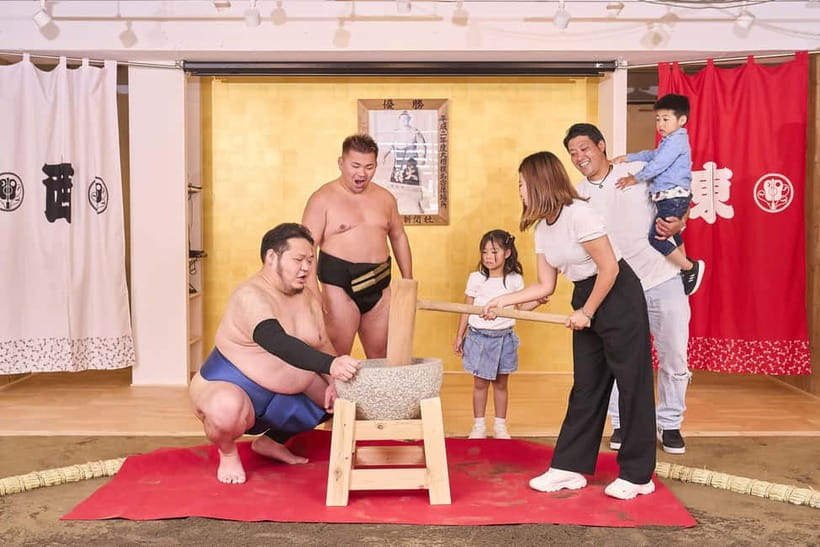 Tokyo Sumo Experience: Chanko & Mochi with a Former Pro - Pounding mochi with the wrestlers