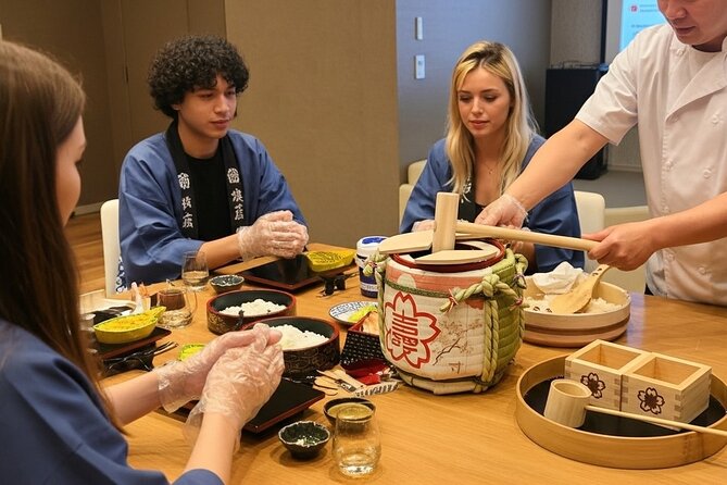 Tokyo Sushi Making Class : Sake Ceremony & Matcha Experience - Starting with kagami-biraki and a cheerful Yoisho