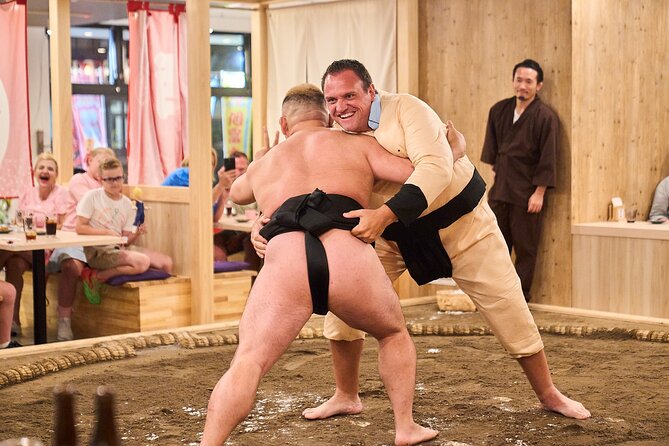 TokyoSumoShow, ChickenHotPot, and Mochi-Pounding by Pro Wrestlers - Mochi pounding is the most approachable activity