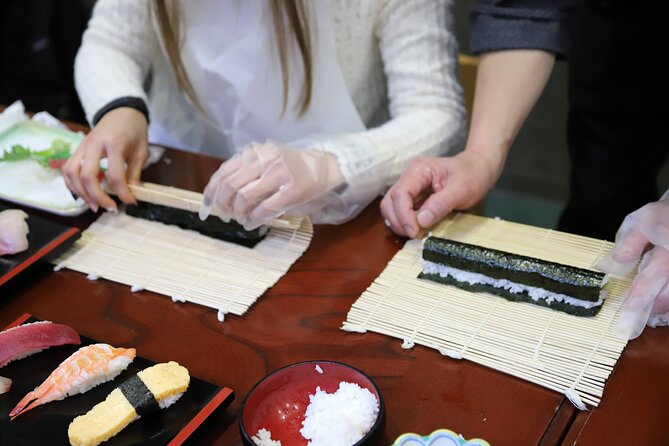Tsukiji Fish Market Guided Tour and Sushi Making with Pro Chef - Starting at Tsukiji Honganji Temple