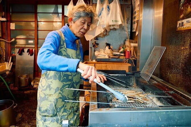 Umami Town Street Food Tour - Osaka Tenmangu Shrine gives the meal a cultural beginning