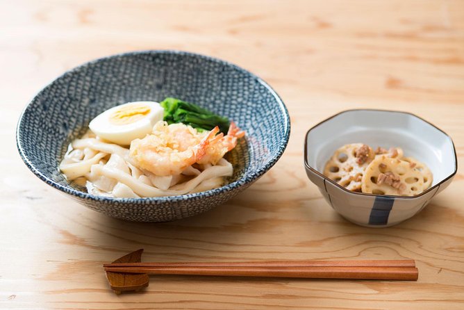 Unique Private Cooking Class with a Tokyo Local Emi - Sitting down to eat with sake and tea