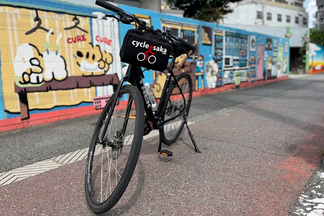Urban Canvas: Osaka Street Art Bike Tour - Osaka by bike: train lines, bridges, and backstreets